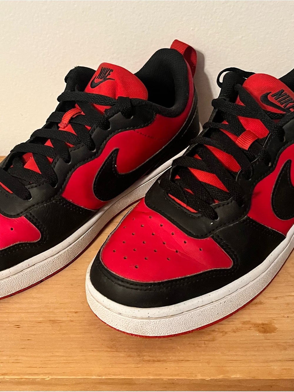 Nike Kids Red and Black Low-Top Sneakers with White Midsole